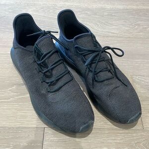 Men’s black Adidas tubular running shoes size 11.5